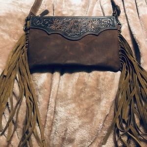 Leather Myra bag with leather tassels. Leather galore! Gorgeous hand tooled!